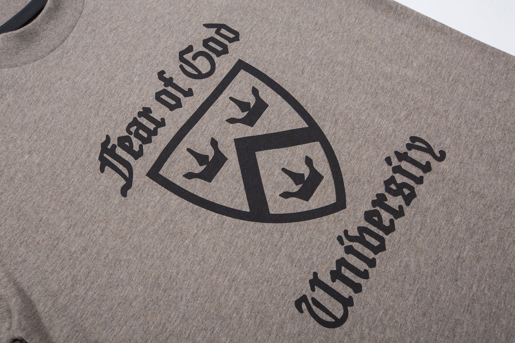 ESSENTIALS University Crest Graphic T-Shirt — detail